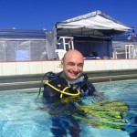 PADI IDC Australia. Dive Student holding fins PADI IDC Australia. Dive Student holding fins